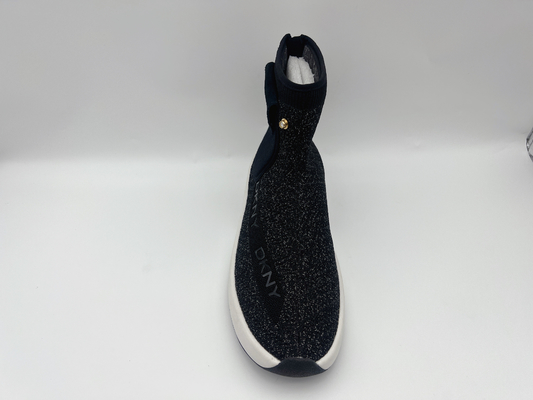 Le scarpe di lavoro resistenti di alto slittamento superiore nero delle signore delicatamente tricottano il tessuto con piegato