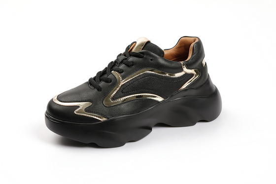 Gli sport atletici delle signore calza le scarpe su ordinazione di slittamento del nero della piattaforma non