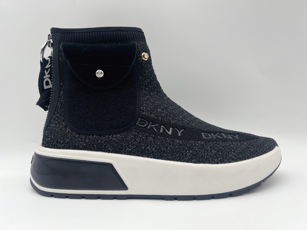 Le scarpe di lavoro resistenti di alto slittamento superiore nero delle signore delicatamente tricottano il tessuto con piegato